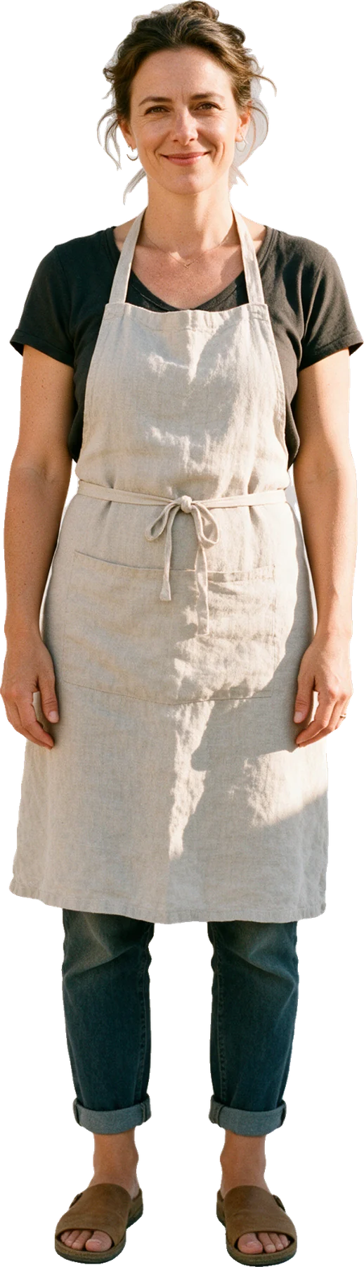 A small business owner, standing confident